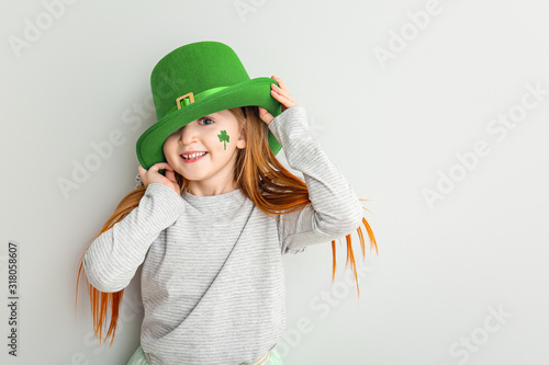 Funny little girl on white ...