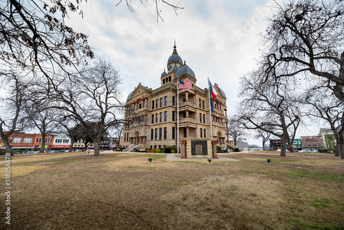 Wide angle of Denton County Courthouse on the Square with Flags Flying photo