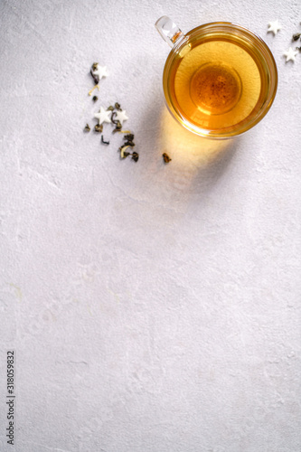 Green tea in glass cup, tonic and antioxidant drink, healthy lifestyle. Lemon flavored beverage