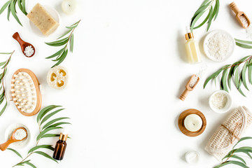 Spa concept with eucalyptus oil and eucalyptus leaf extract natural /organic spa cosmetics products, eco friendly bathroom accessories. Skincare concept on white background. Flat lay composition top v