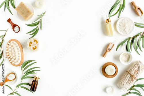 Spa concept with eucalyptus oil and eucalyptus leaf extract natural  organic spa cosmetics products  eco friendly bathroom accessories. Skincare concept on white background. Flat lay composition top v