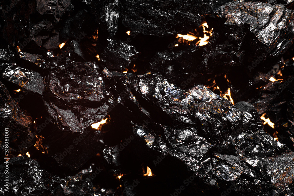 Black charcoal texture, red-hot natural mineral resource background