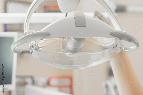 Modern dental lamp isolated on a white background