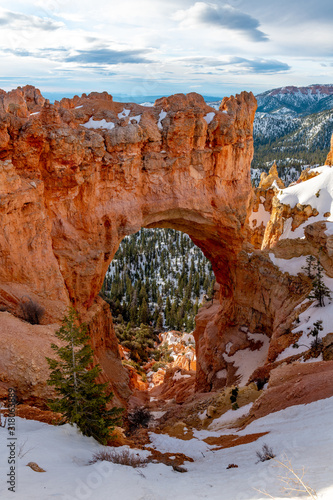 Hole in a rock cliff forming an arch Bryce Canyon Utah