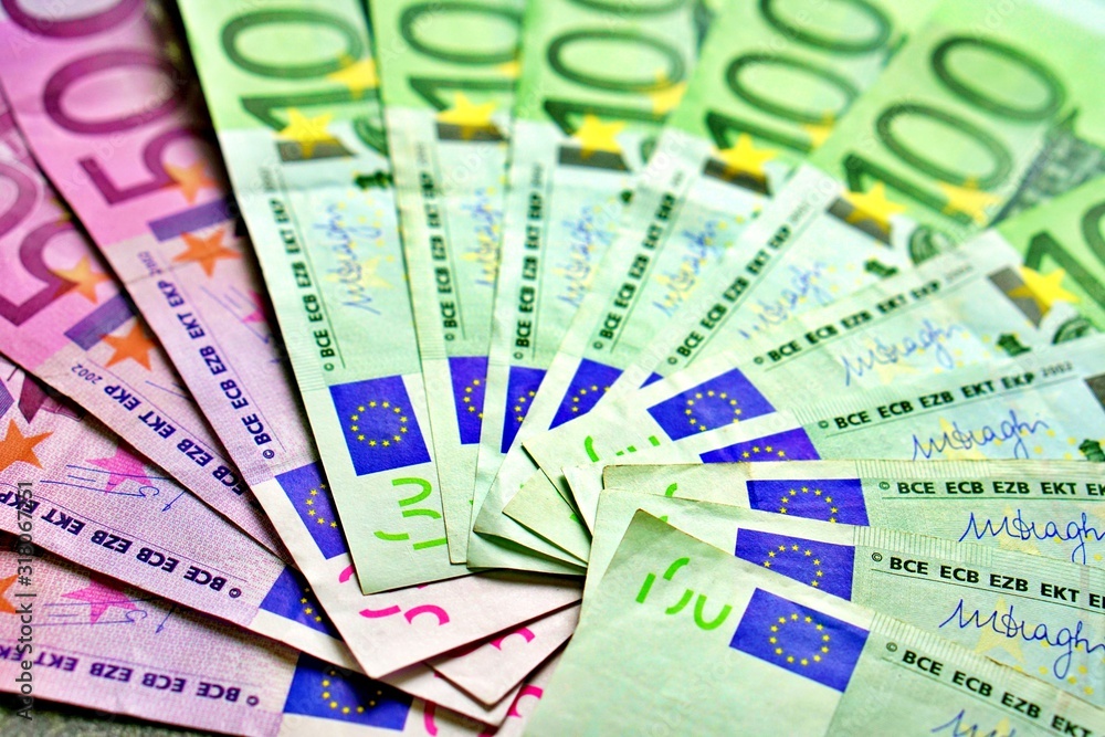 United country's payment system - euro money cash background, pile of paper euro banknotes. United country's payment system - euro money cash background, pile of paper euro banknotes.