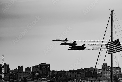 Photography Grayscale shot of fighter jets in the sky with the American flag on the side
