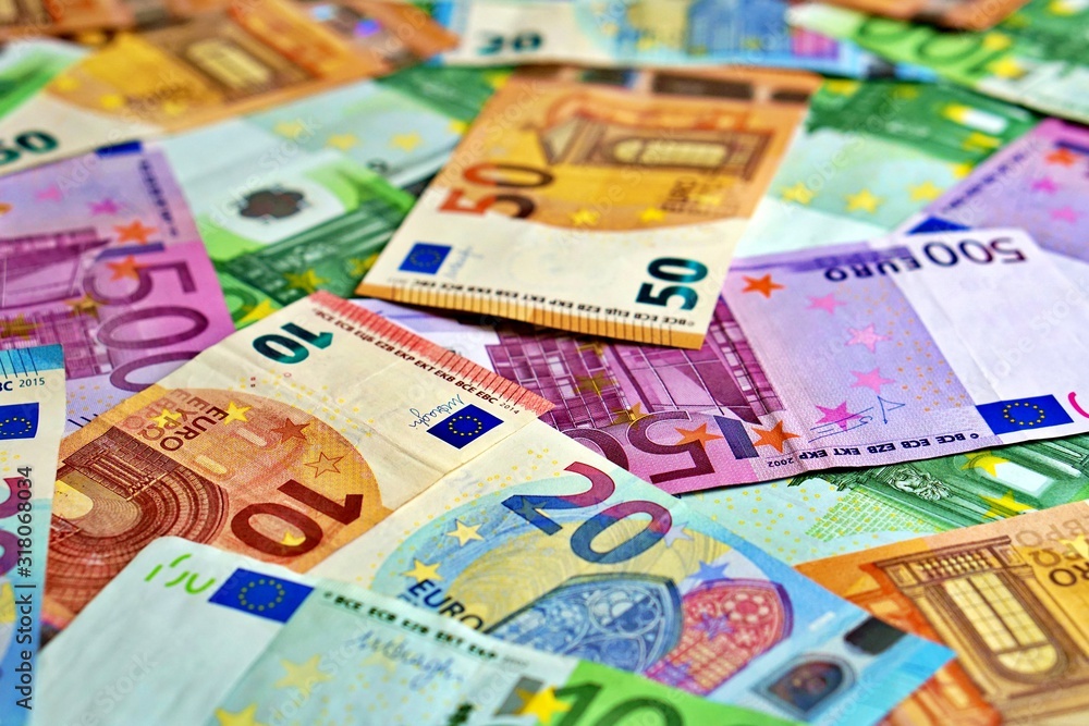 United country's payment system - euro money cash background, pile of paper euro banknotes. United country's payment system - euro money cash background, pile of paper euro banknotes.
