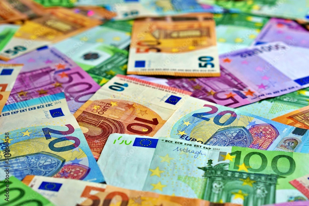 United country's payment system - euro money cash background, pile of paper euro banknotes. United country's payment system - euro money cash background, pile of paper euro banknotes.