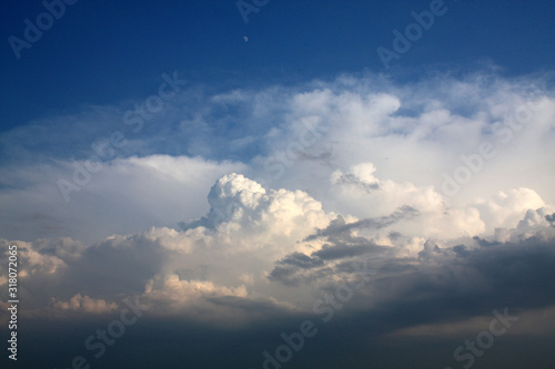 storm clouds on deep blue sky © Bogdan