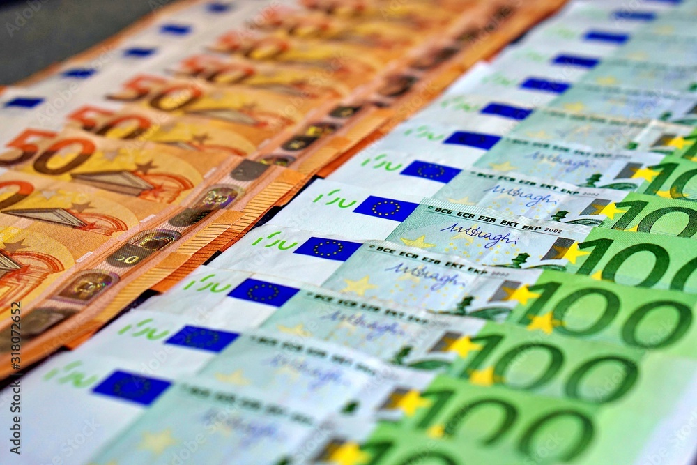 United country's payment system - euro money cash background, pile of paper euro banknotes.