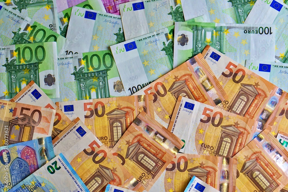 United country's payment system - euro money cash background, pile of paper euro banknotes.	