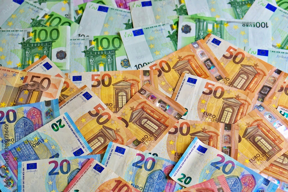 United country's payment system - euro money cash background, pile of paper euro banknotes.	