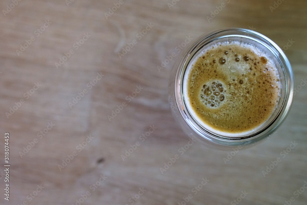 Coffee time in office. Capsule espresso in double glass cup - 100% arabica Coffee time in office. Capsule espresso in double glass cup - 100% arabica