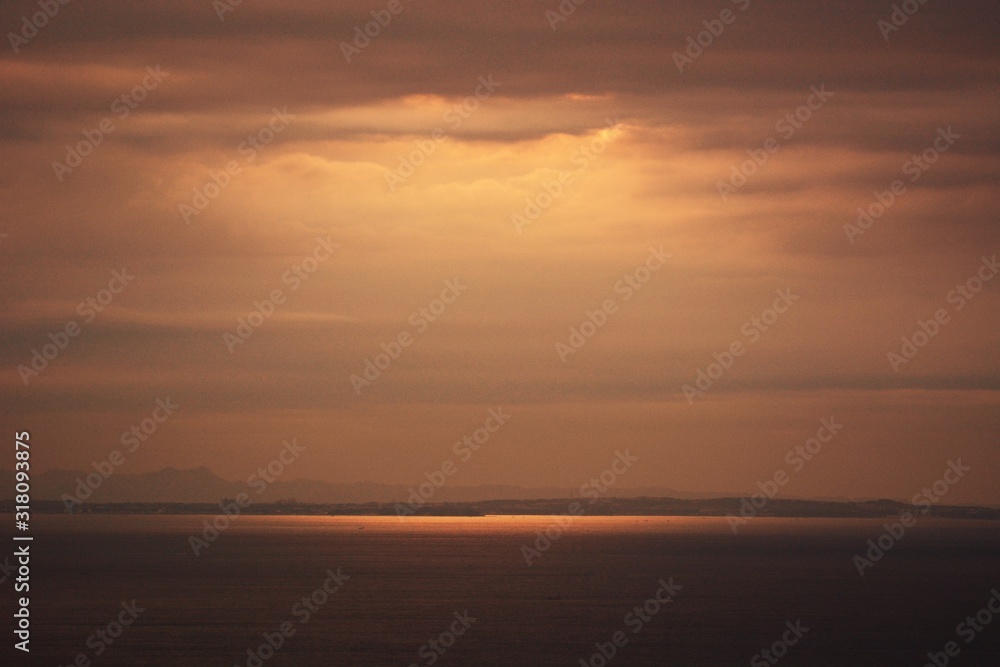 Background material of natural scene / Sunrise shine reflected on the sea surface.