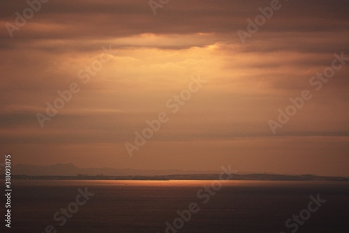Background material of natural scene / Sunrise shine reflected on the sea surface. © tamu