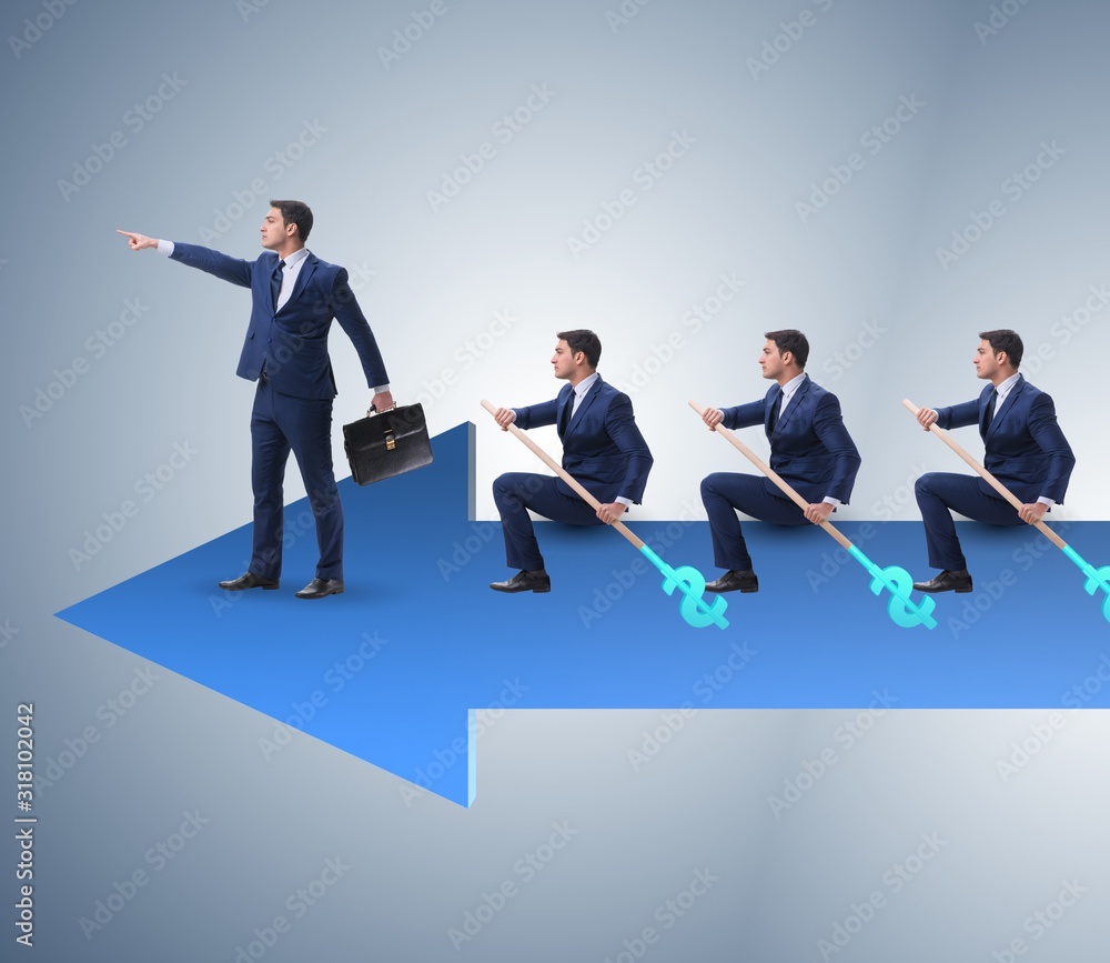 Team of businessmen in teamwork concept with boat Team of businessmen in teamwork concept with boat