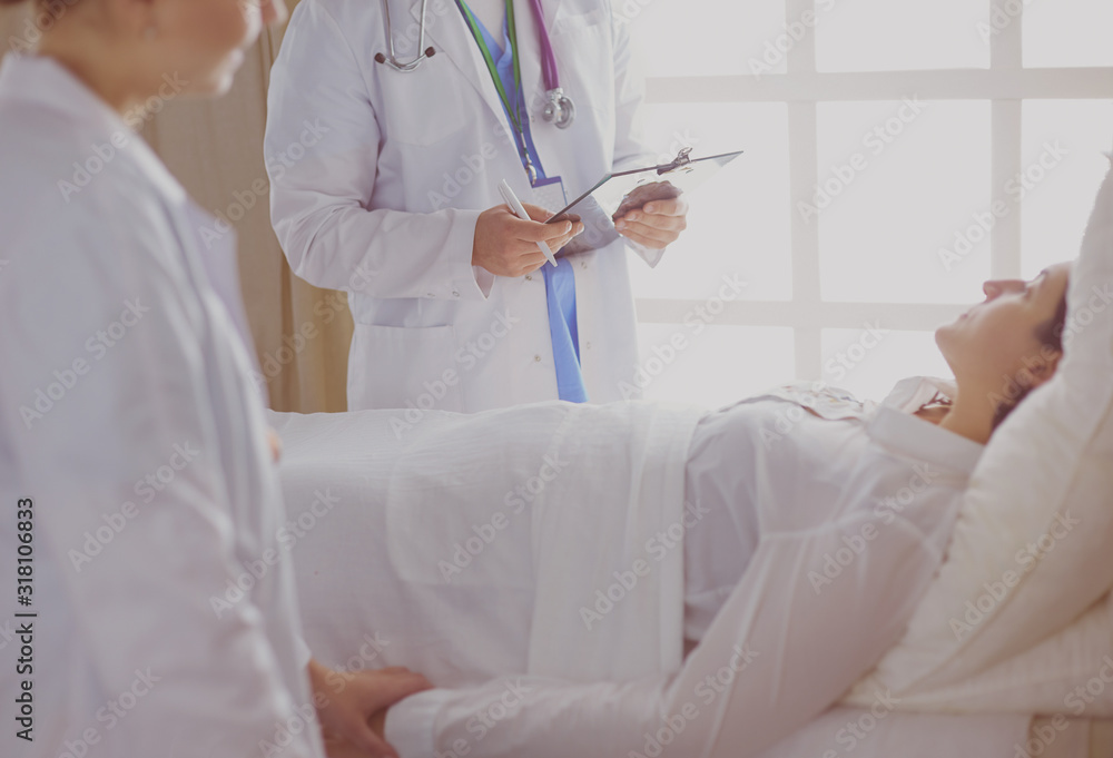 doctor or nurse talking to patient in hospital doctor or nurse talking to patient in hospital