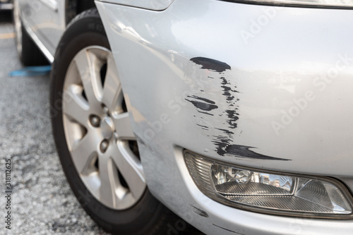 Scratch on car bumper due to minor accident photo
