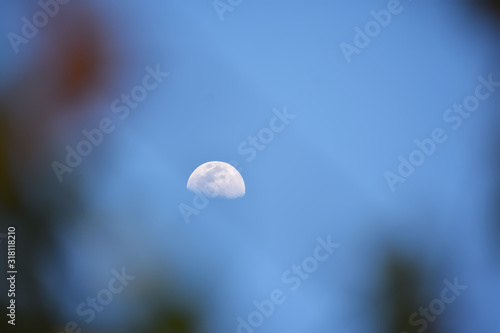 day moon whith blue sky background viwe image