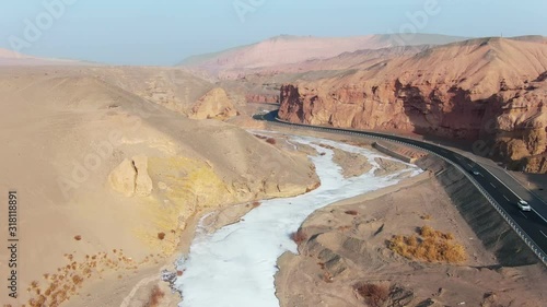 Aerial view of China Xinjiang Taklamakan Desert Aera Canyon in winter season. Drone shot footage 4k(UHD). photo