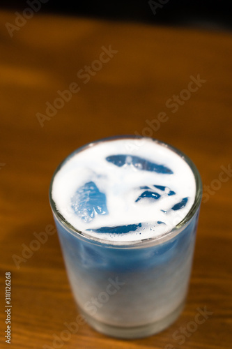 glass of water on blue background