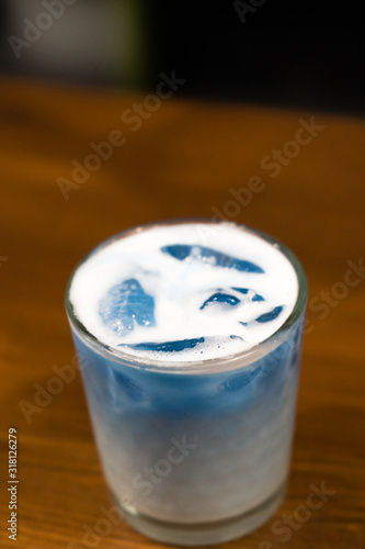 glass of water with ice on black background