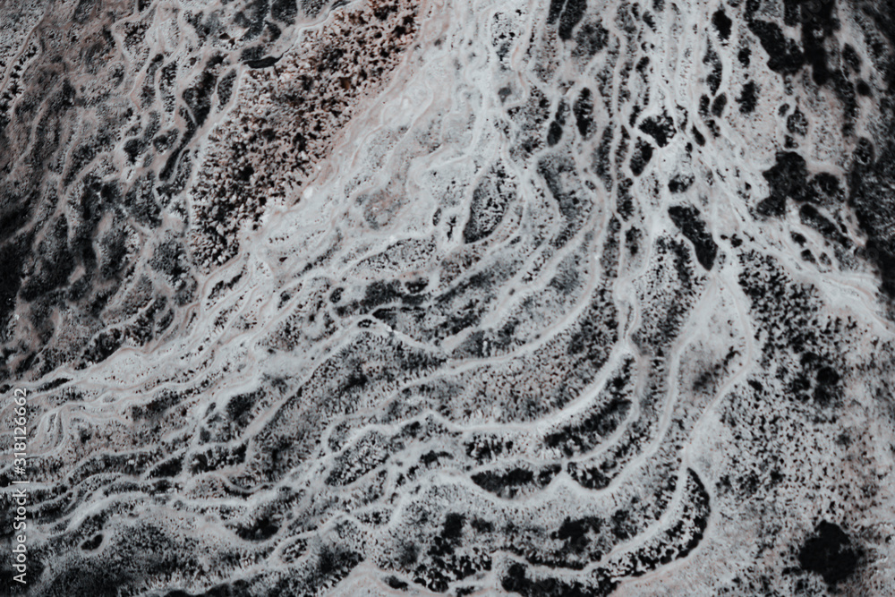 Naklejka premium abstract background with dry round reeble stones