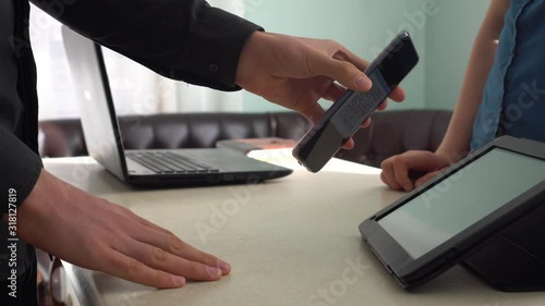 E-tickets  for online bookings. The customer displays the e-ticket on the screen of their phone and show it to member of staff at the guest service point so they can scan it and admit to the event