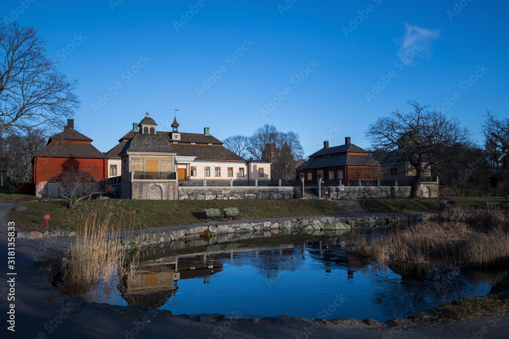 Old falu red houses in a Stockholm park Old falu red houses in a Stockholm park