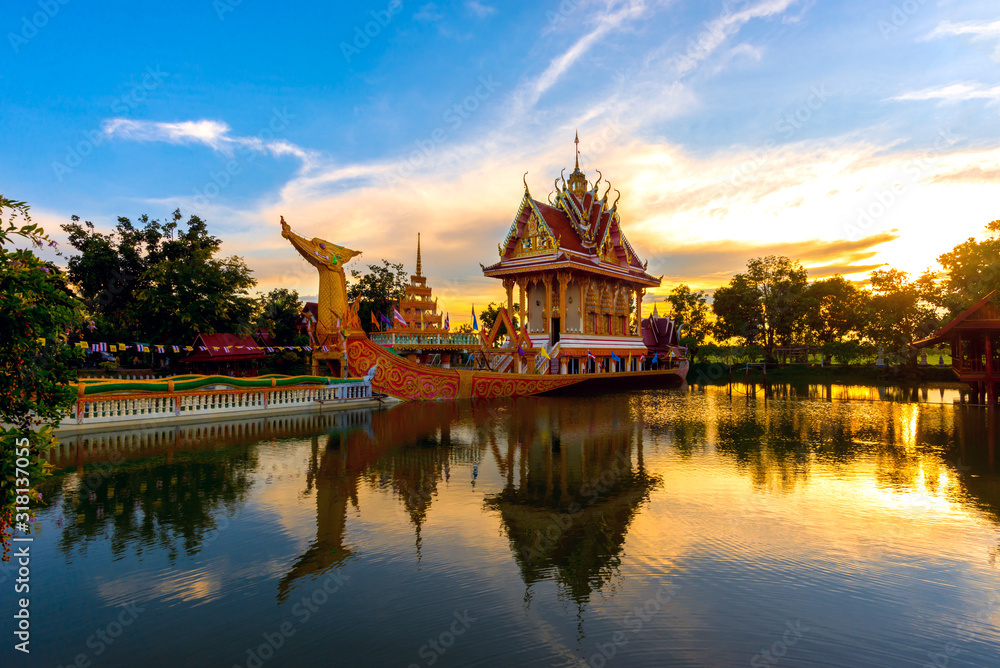 A huge Thai Suphannahong, also called Golden Swan or Phoenix boat at the WatpahSuphannahong Temple sunlight day time in sisaket, Thailand A huge Thai Suphannahong, also called Golden Swan or Phoenix boat at the WatpahSuphannahong Temple sunlight day time in sisaket, Thailand