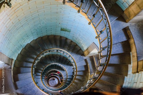 Beautiful spiral staircase to the top of Eckmuhl lighthouse, on the Penmarsh Peninsula. Brittany. France