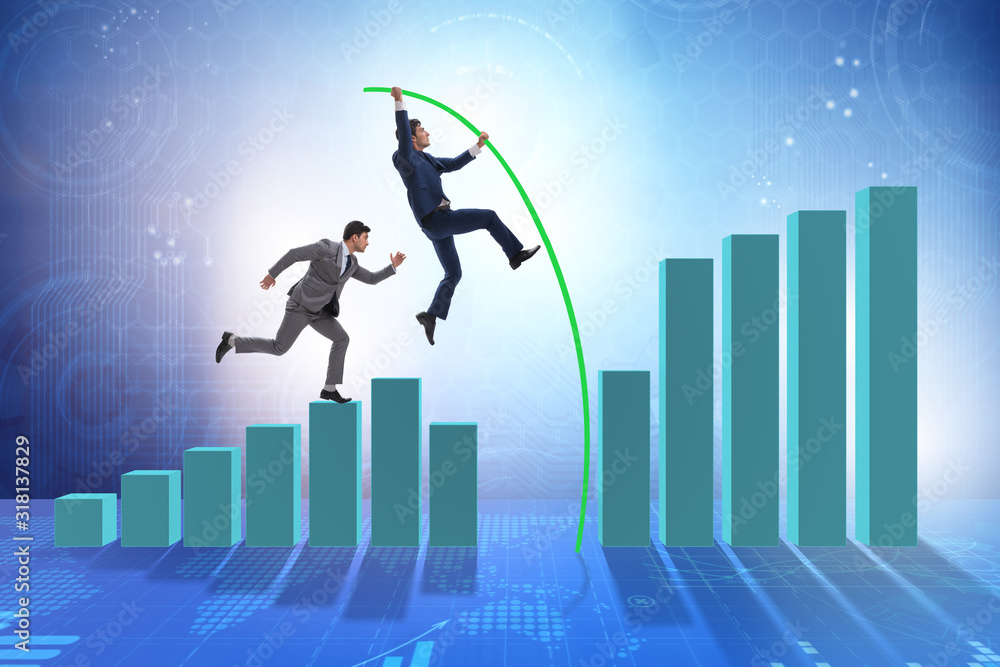 Businessman vault jumping over bar charts Businessman vault jumping over bar charts