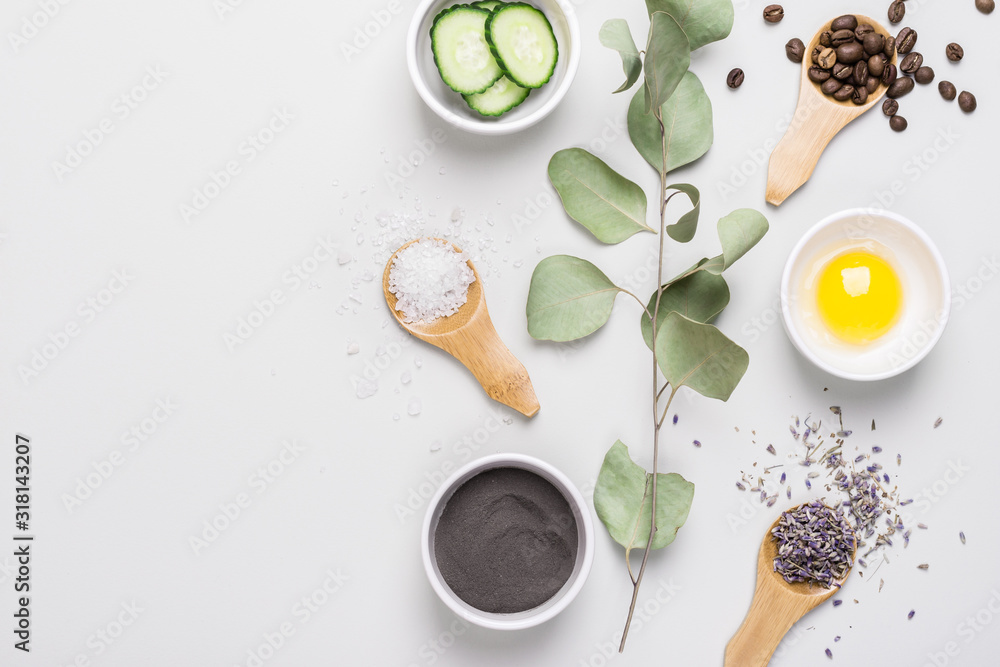 Natural ingredients for making DIY skin care cosmetic. Bowls with clay, yolk, cucumber and other organic ingredients Natural ingredients for making DIY skin care cosmetic. Bowls with clay, yolk, cucumber and other organic ingredients