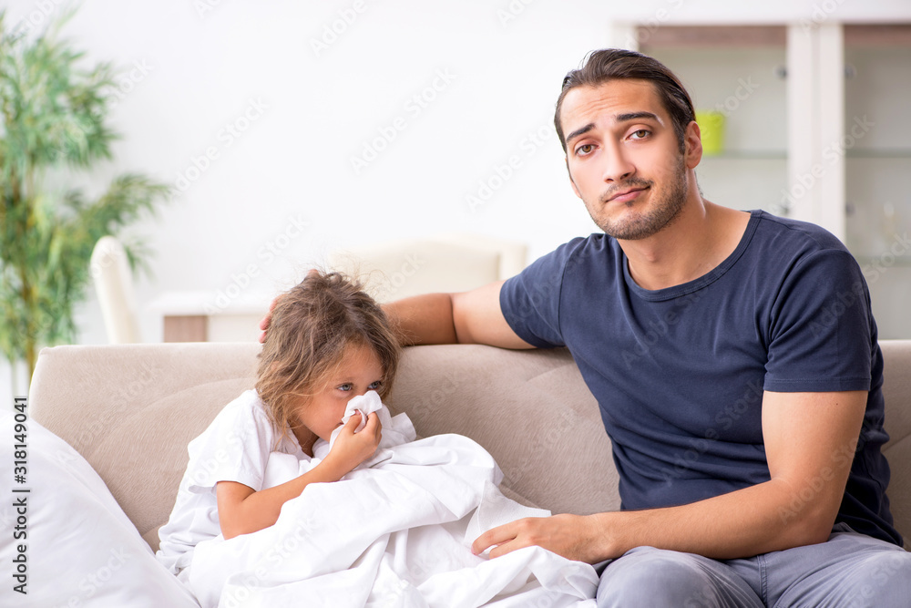 Father taking care of his ill daughter Father taking care of his ill daughter
