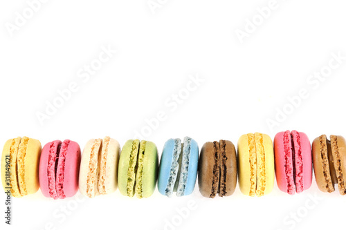 Colorful macarons isolated on the white background