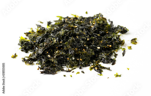 Crispy Nori Seaweed with sesame and sea salt, isolated on a white background. Crunchy Seaweed Snack. 
