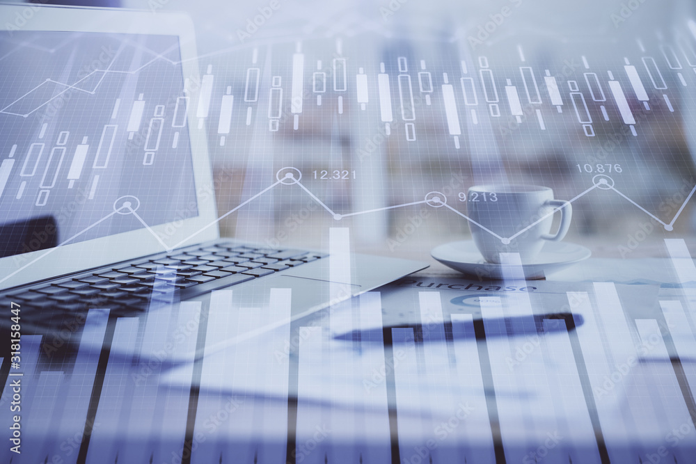 Forex graph hologram on table with computer background. Double exposure. Concept of financial markets. Forex graph hologram on table with computer background. Double exposure. Concept of financial markets.