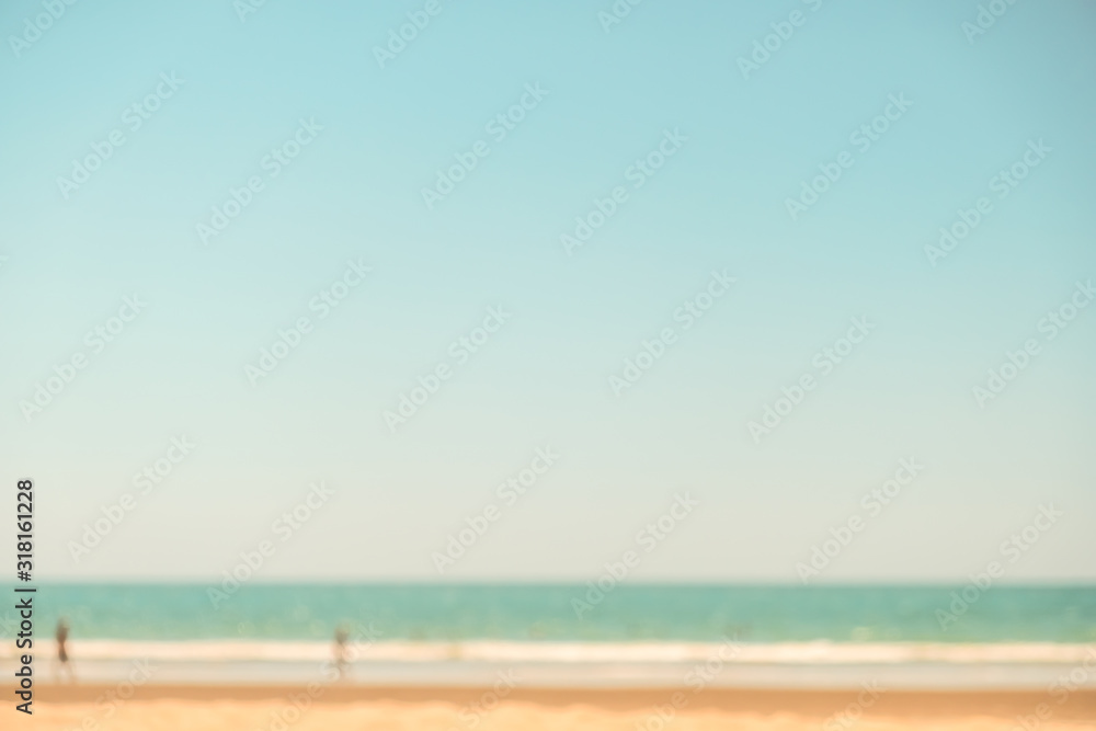 Abstract background of blurred beach and sea waves. In the summer vacation. vintage filter.