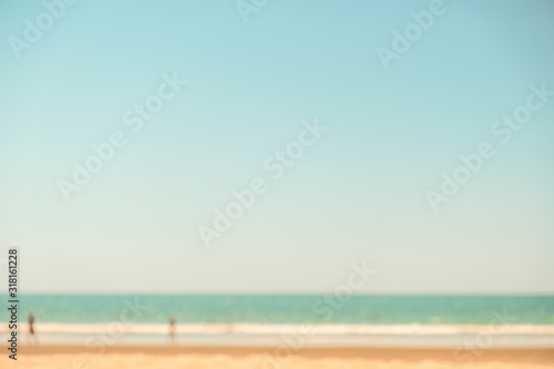 Abstract background of blurred beach and sea waves. In the summer vacation. vintage filter.