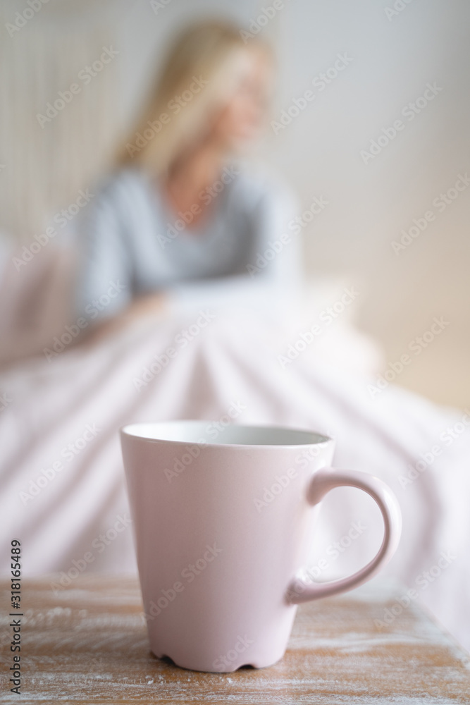 Lovely pink mug on the table stock photo Lovely pink mug on the table stock photo