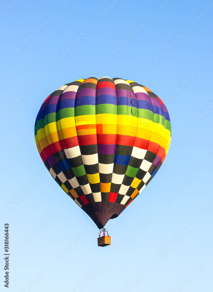 colorful hot air balloon against blue sky colorful hot air balloon against blue sky