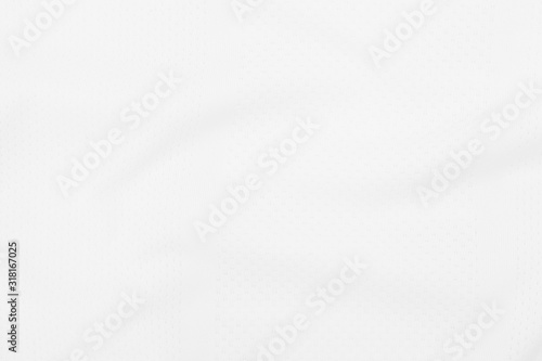 White fabric texture background with soft waves.