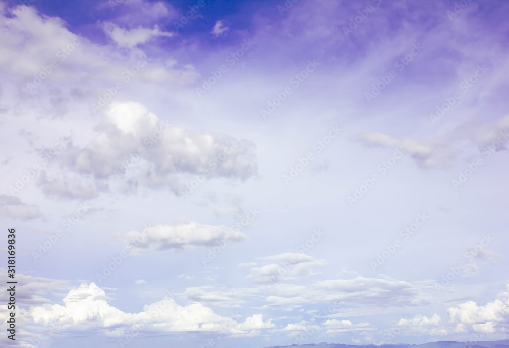 Obraz premium blue sky with white clouds background.