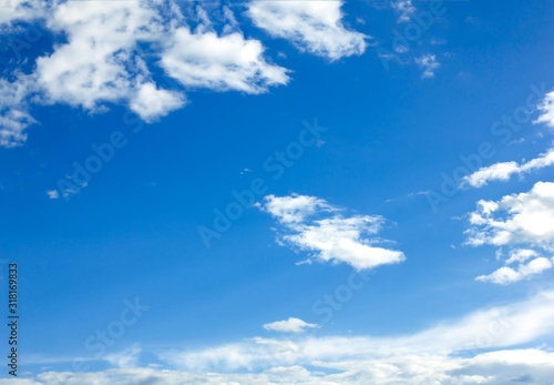 blue sky with white clouds background.