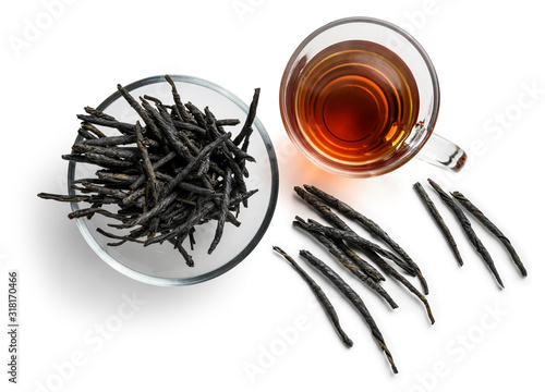 Tea Kuding on a white background. The view from the top photo