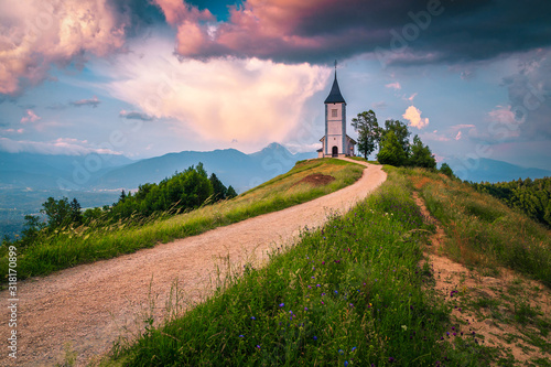 Picturesque alpine landscape with Saint Primoz church, near Jamnik, Slovenia