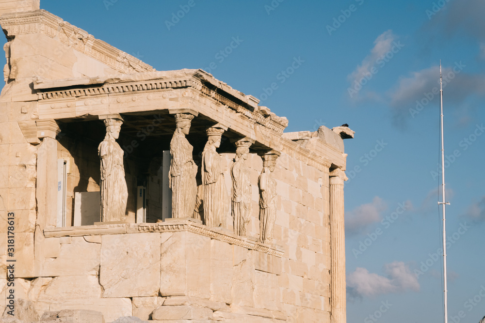 Obraz premium Athens, Greece - Dec 20, 2019: Erechtheion Temple with Caryatids, Caryatid Porch, Acropolis, Athens, Greece