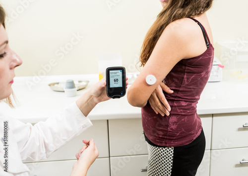 Medical device for glucose check. Continuous glucose monitoring pod.  photo