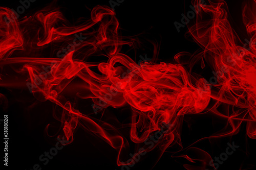 Red smoke on black background, dense smoke