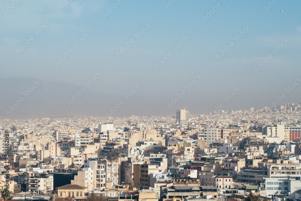 Athens, Greece - Dec 21, 2019: A thick layer of smog covering the city of Athens, Greece